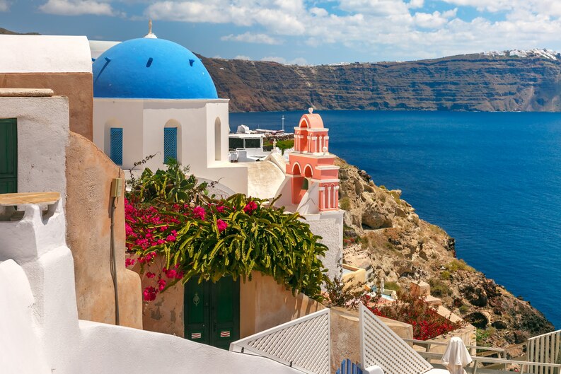 Exploring the Majestic Contrasts: Santorini’s Aegean Charm and South Africa’s Vibrant Landscapes 
